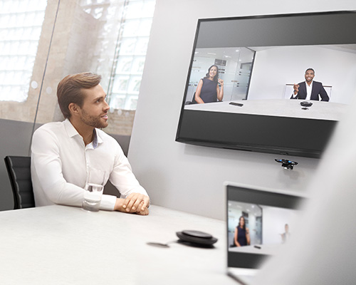 Man sat at desk joinging a Jabra PanaCast video call