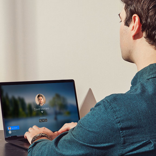 Man using Windows 10 Pro laptop with Windows Hello