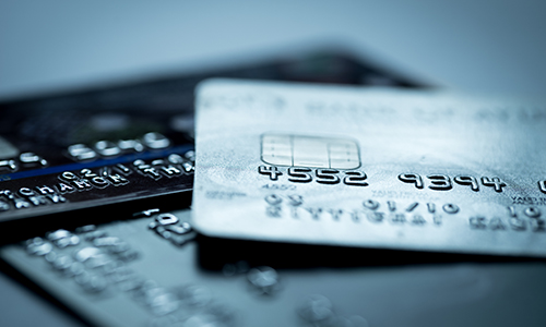 Several credit cards on table