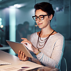 Female teacher self-learning on iPad