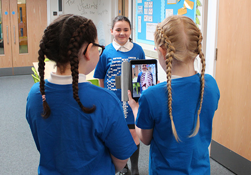 Surface Pro Girls scanning body with AI