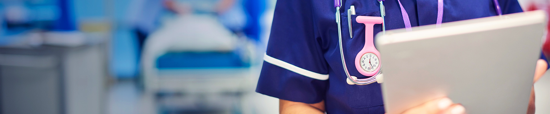 nurse holding tablet