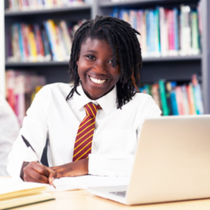 School girl using laptop