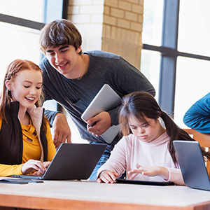 students in class using mobile devices